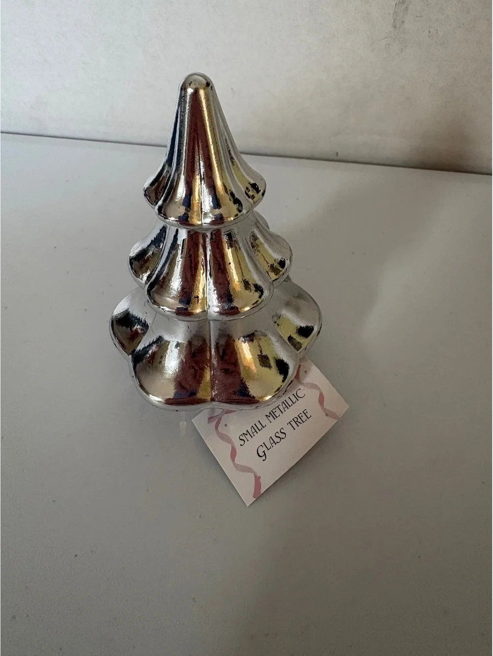Small metallic glass tree